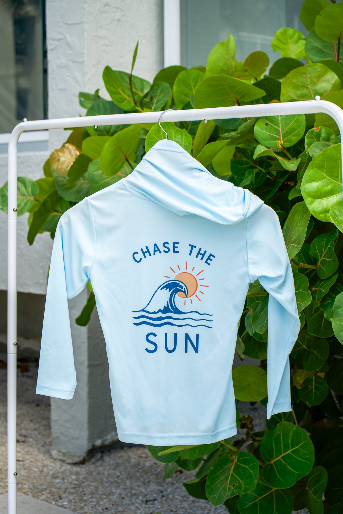 Back view of the Youth Sun SRQutie SPF Hooded Tee
