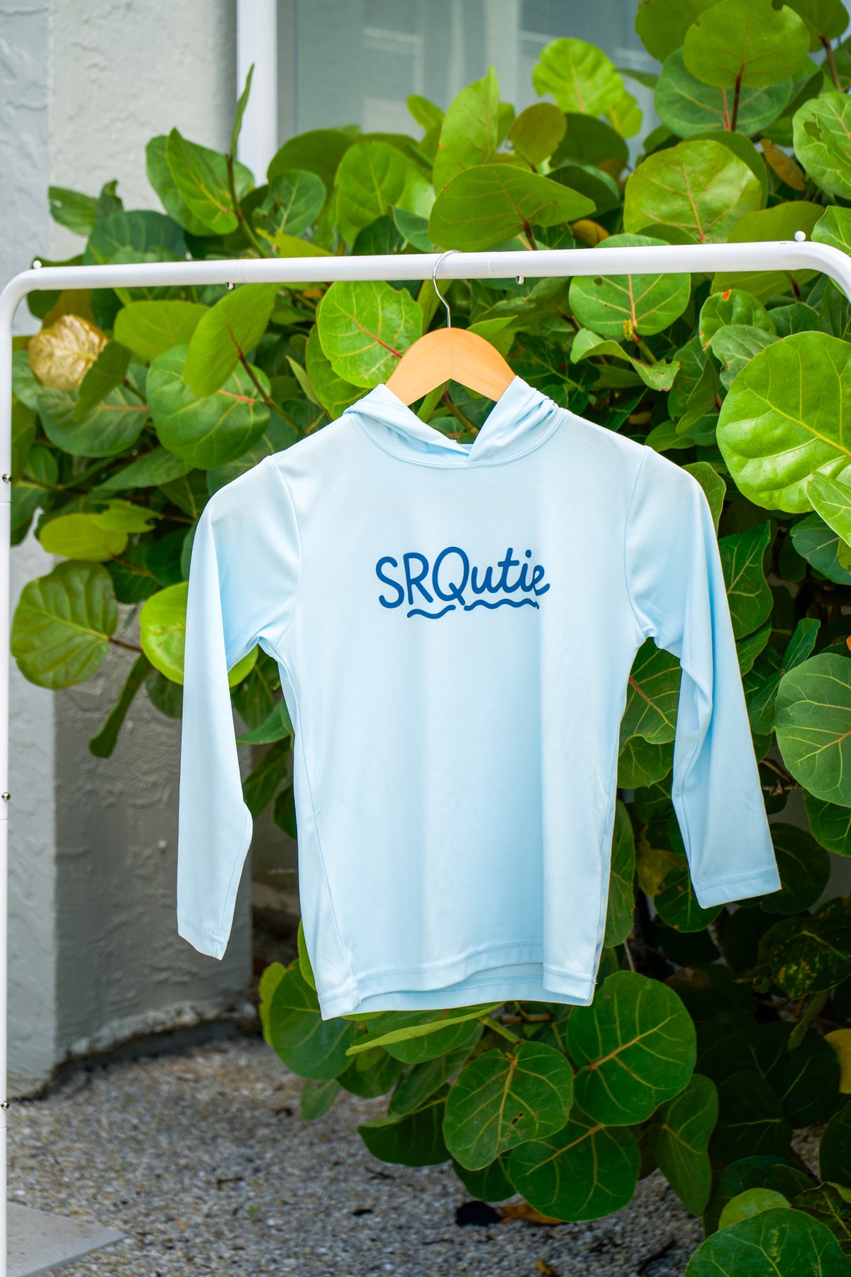 Front view of the Youth Sun SRQutie SPF Hooded Tee