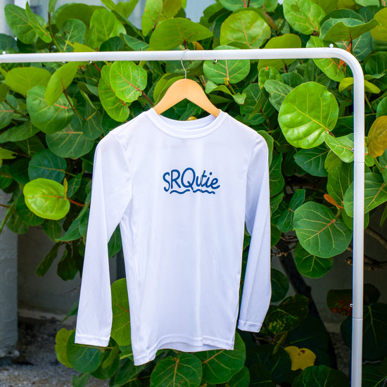 Front view of the Youth Sun SRQutie SPF LS Tee
