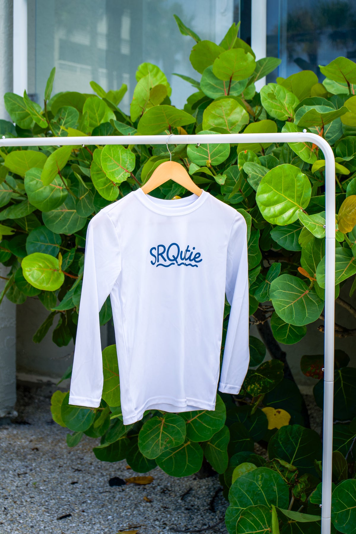 Front view of the Youth Sun SRQutie SPF LS Tee
