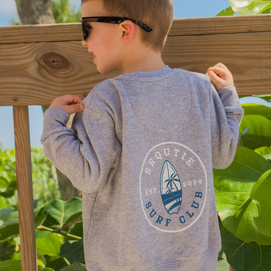 Lifestyle photo of the Youth Coastal Crew Sweatshirt