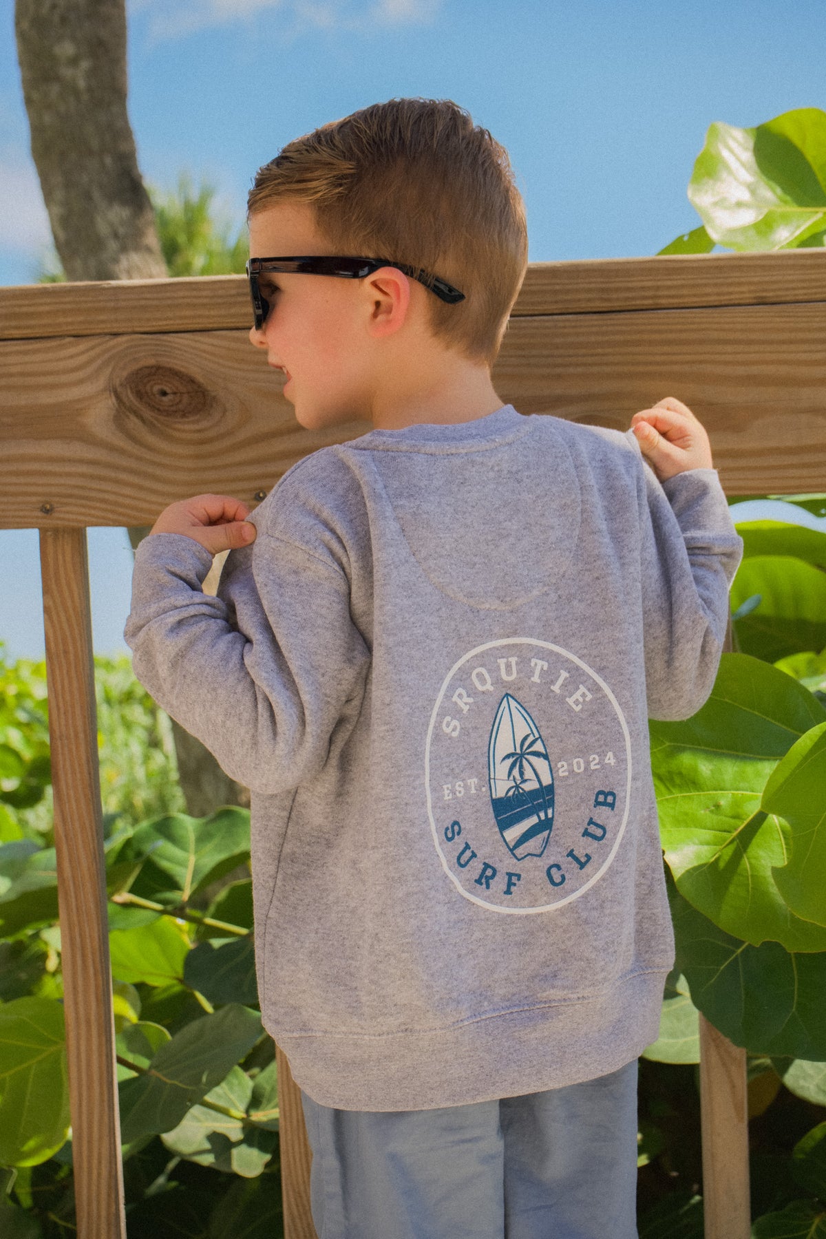 Lifestyle photo of the Youth Coastal Crew Sweatshirt