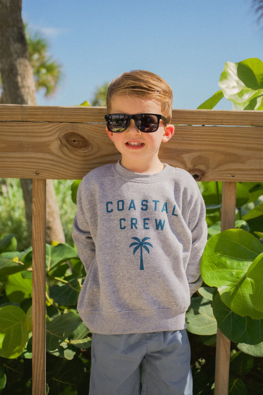 Lifestyle photo of the Youth Coastal Crew Sweatshirt