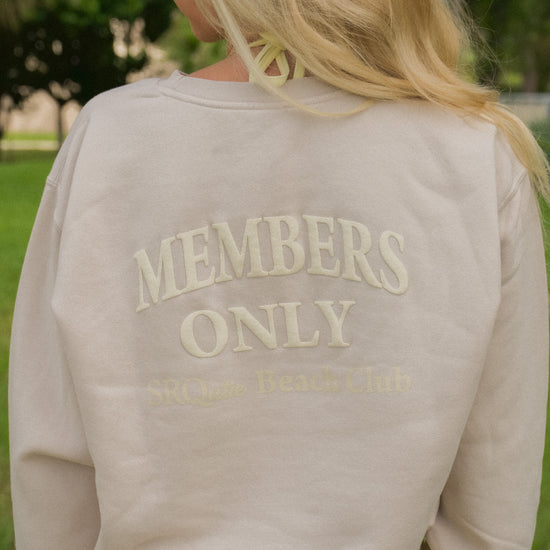 Lifestyle photo of the women's Members Only SRQutie Sweatshirt