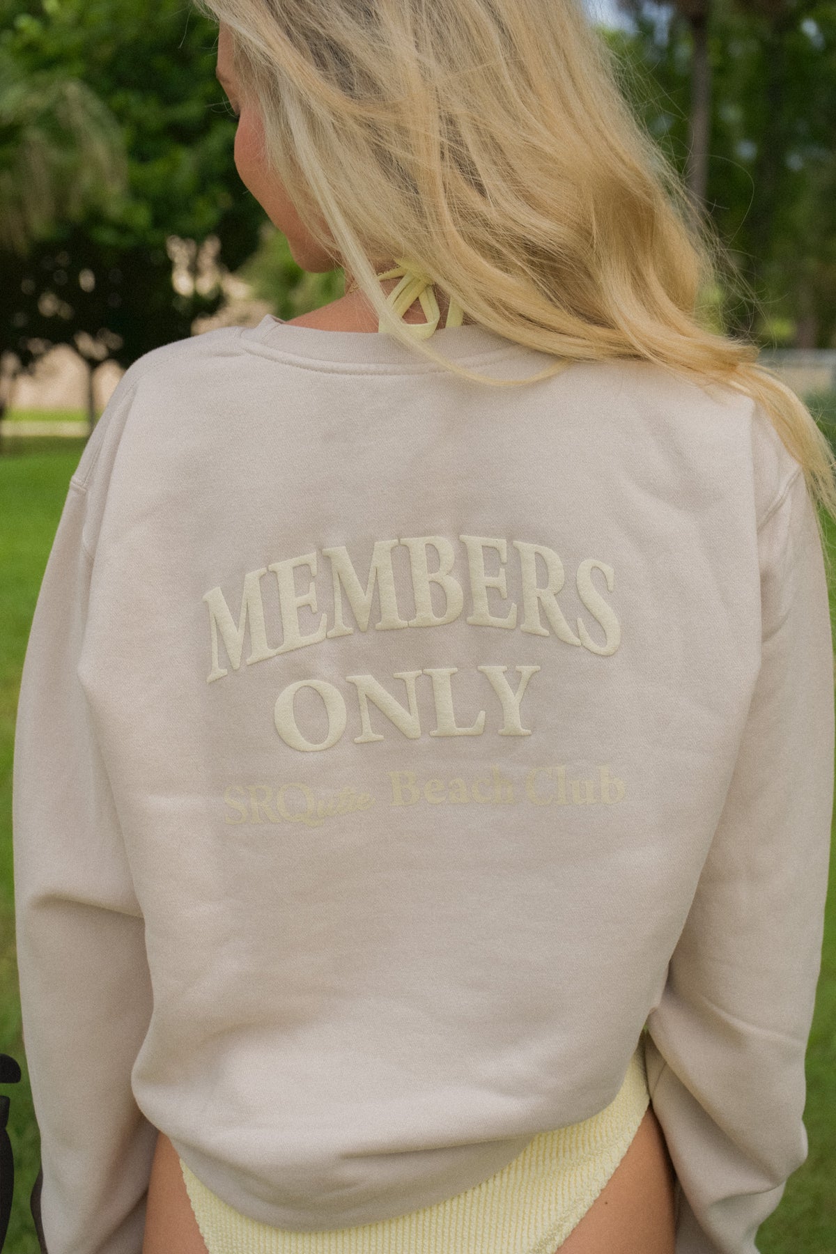 Lifestyle photo of the women's Members Only SRQutie Sweatshirt