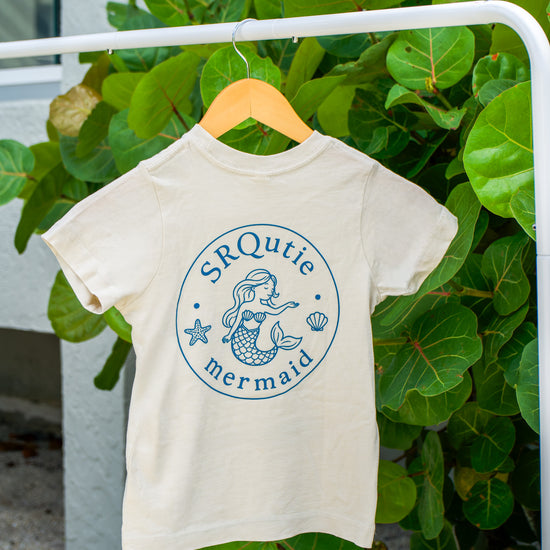 Back view of the Youth Mermaid SRQutie Tee in Natural