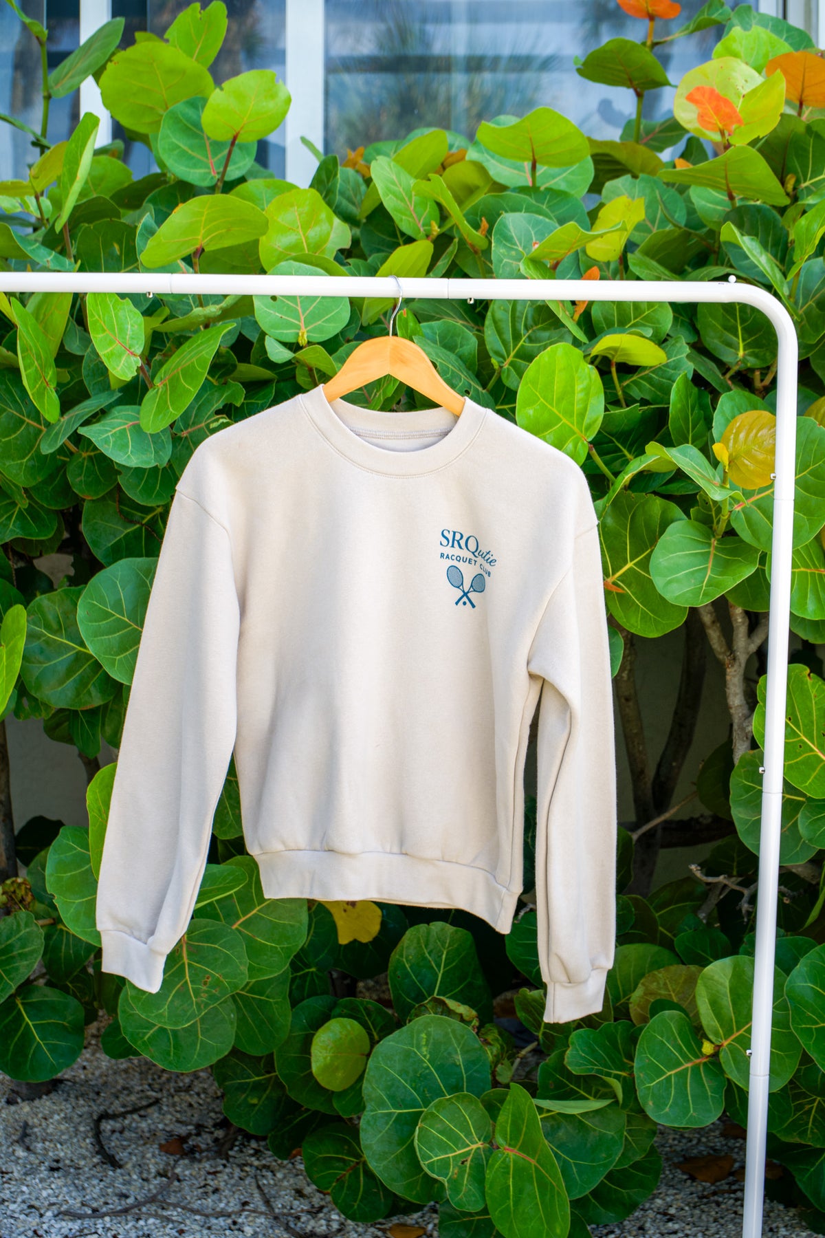 Front view of the Racquet Club SRQutie Sweatshirt