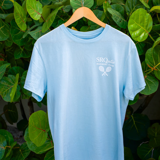 Front view of the Racquet Club SRQutie Tee in Glacier