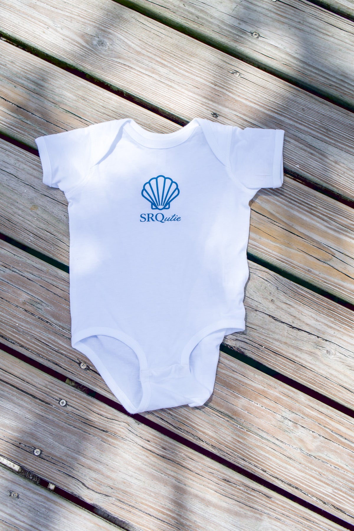 The Shell SRQutie Onesie in White