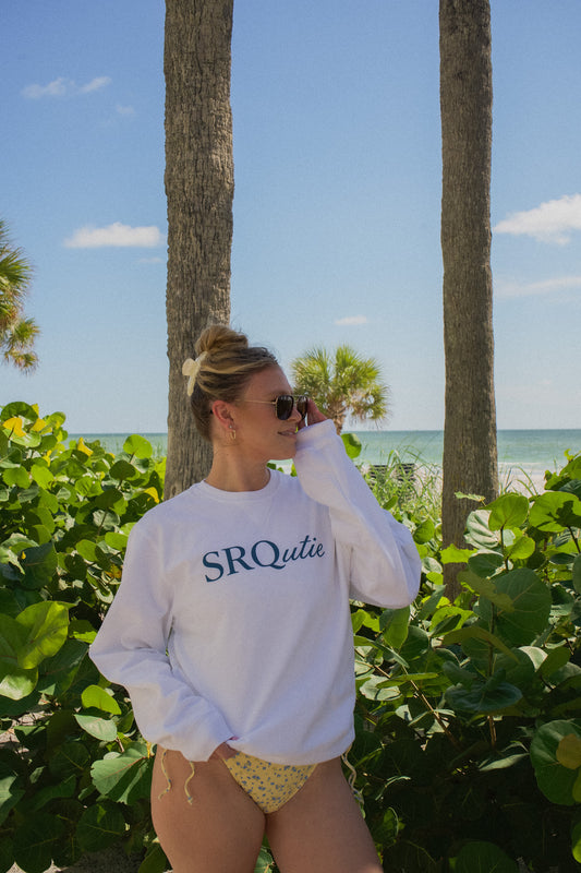 Lifestyle photo of the women's Signature SRQutie Sweatshirt