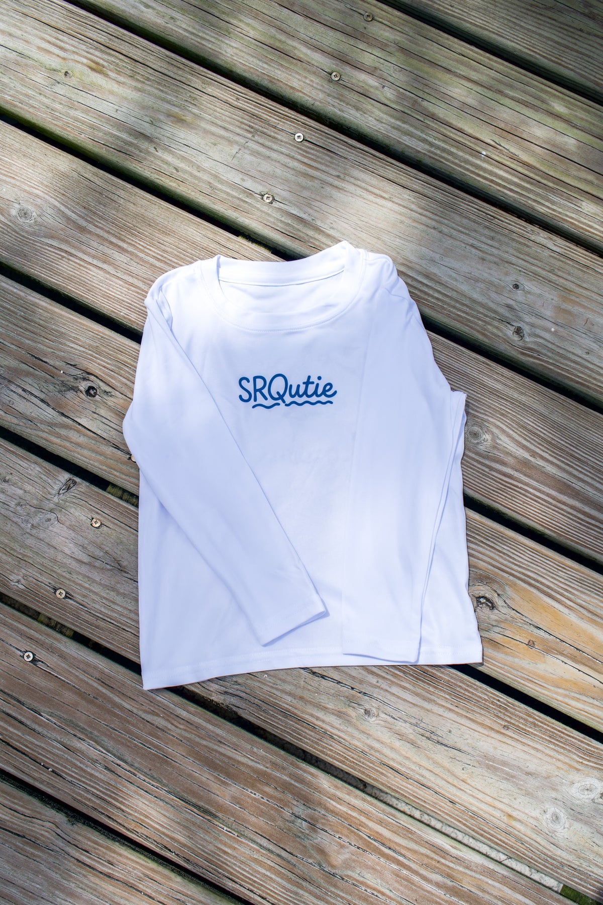Front view of the Toddler Salty SRQutie SPF LS Tee