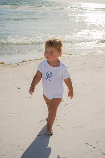 Lifestyle photo of the Shell SRQutie Onesie