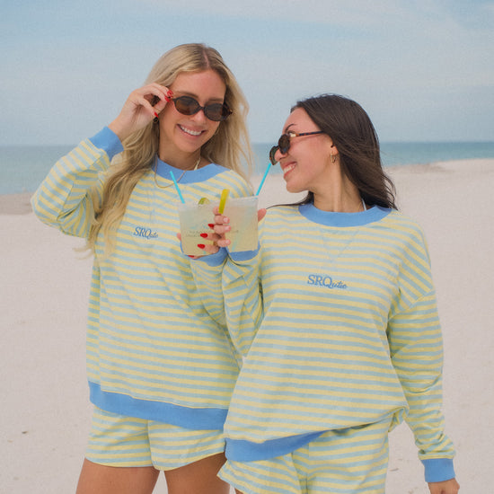 Lifestyle photo of the women's SRQutie Striped Short Set