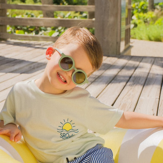 Lifestyle photo of the Youth Sunset SRQutie Tee