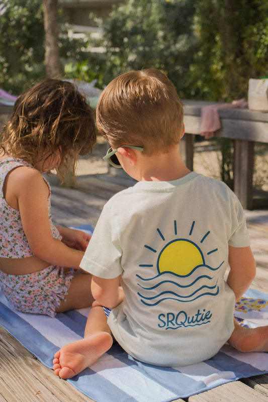 Lifestyle photo of the Youth Sunset SRQutie Tee