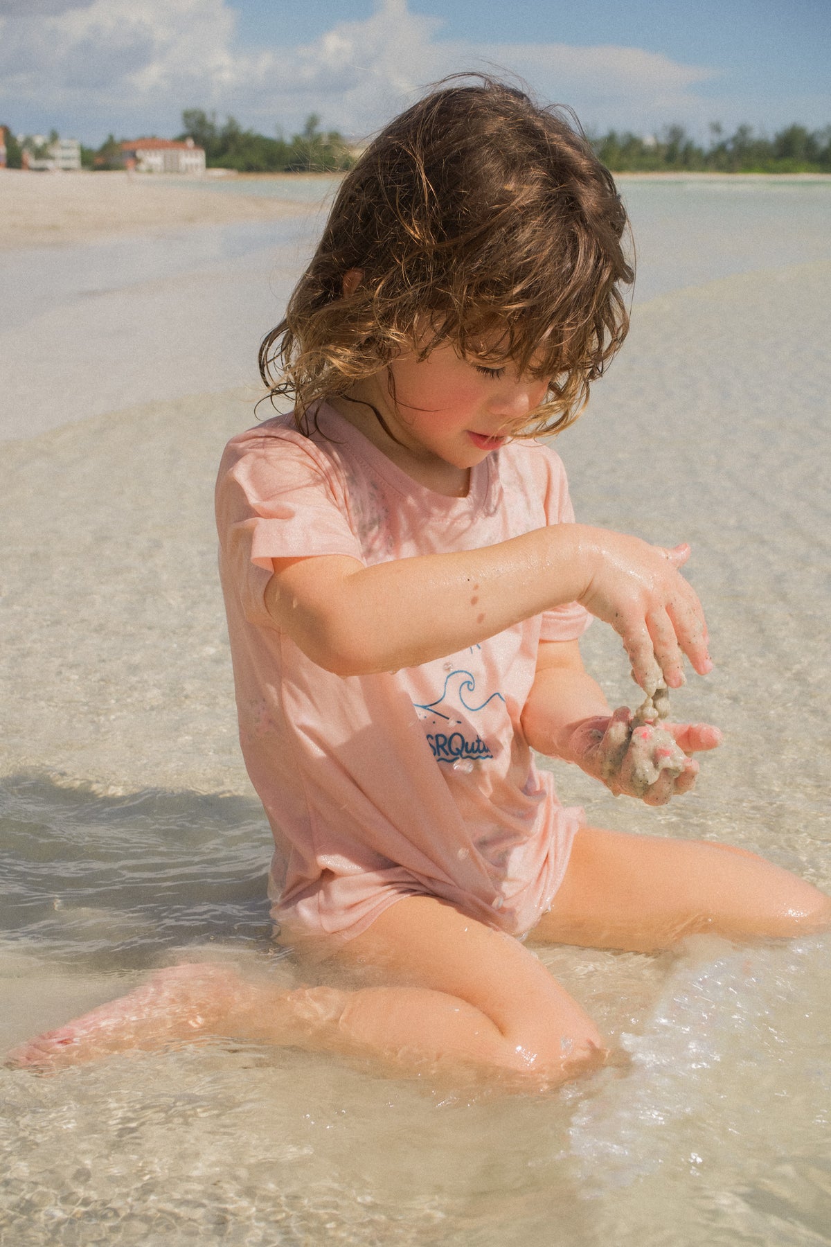 Lifestyle photo of the Toddler Wave SRQutie Tee